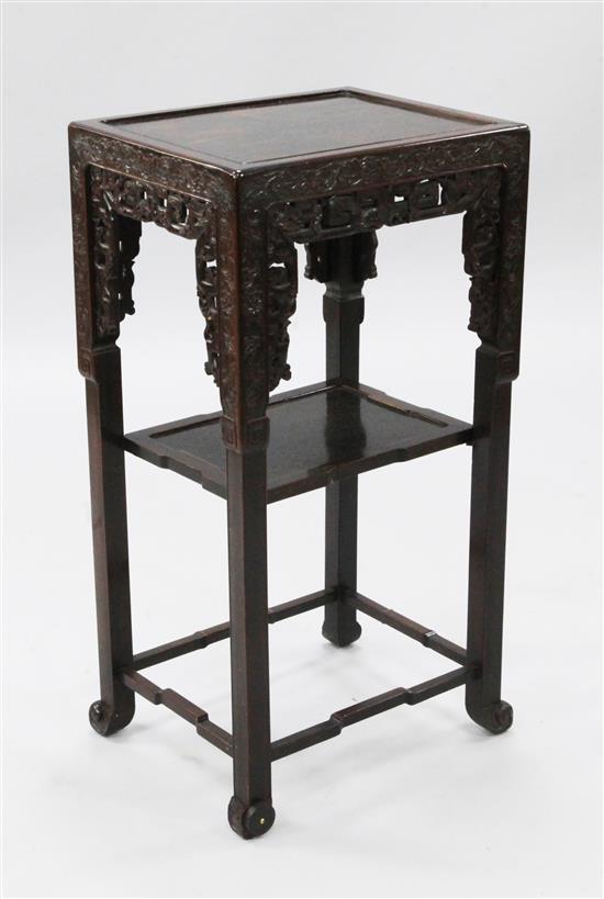 An early 20th century Chinese hardwood two tier occasional table, W.1ft 4in. D.1ft 1in. H.2ft 7in.